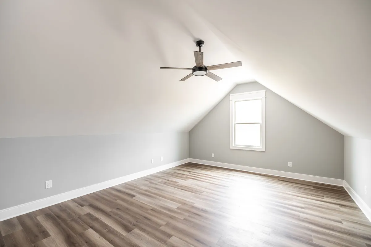 19-by-14 bonus room over the garage with a vaulted ceiling at 1200 Vickie Ln