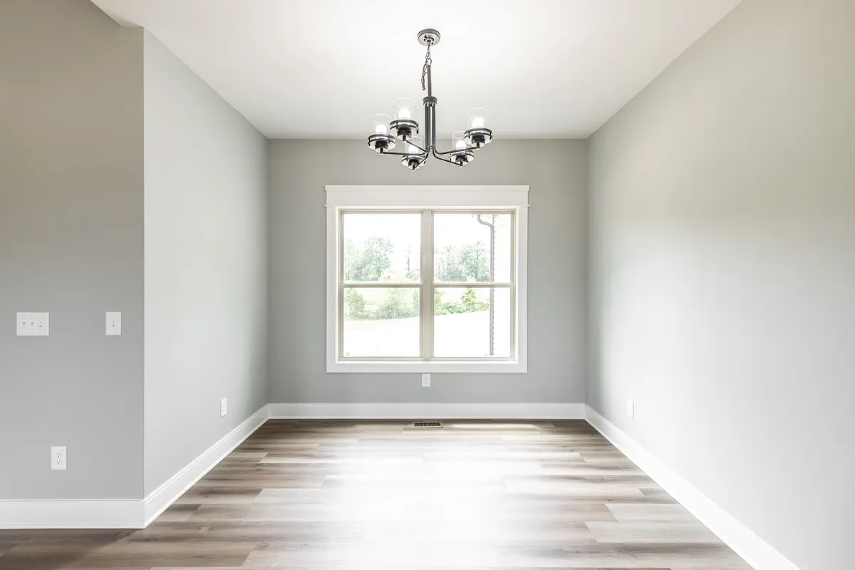 Dining area with chandelier and natural light at 1200 Vickie Ln
