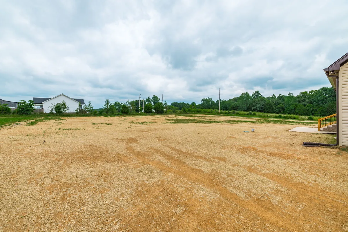 Just over an acre of open yard with no homes directly across the street at 1200 Vickie Ln