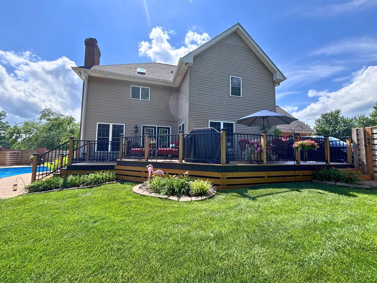 New deck and in-ground pool in the fenced backyard at 129 Baldridge Dr