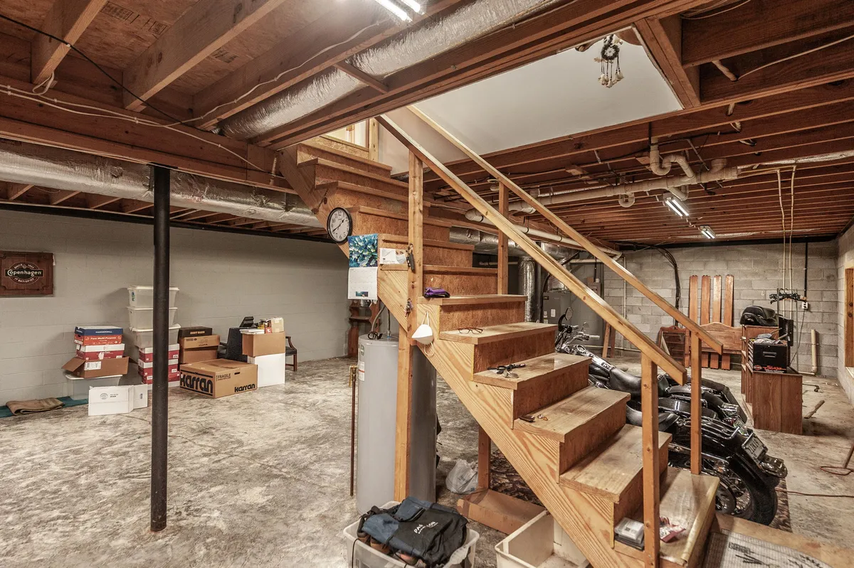 Full unfinished basement with potential for future living space at 6513 N Mount Pleasant Rd